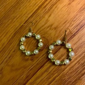 Elegant, minimalist, Hooped Gold and pearl colored earrings.